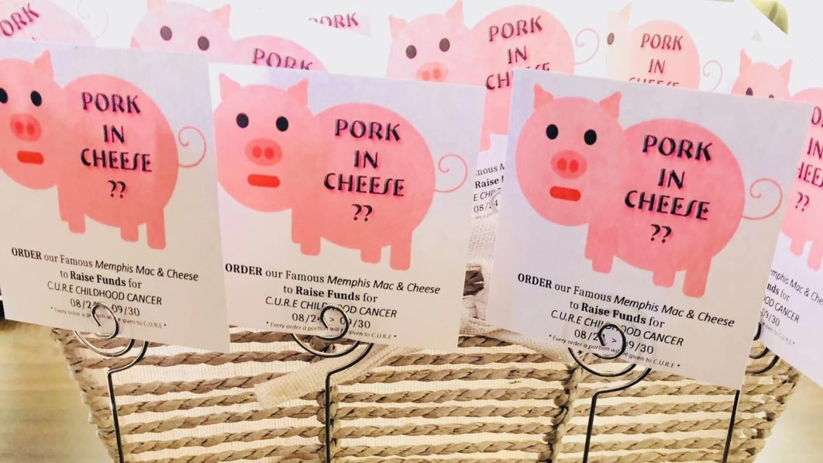 58 Main table signs promote the September Mac and Cheese special