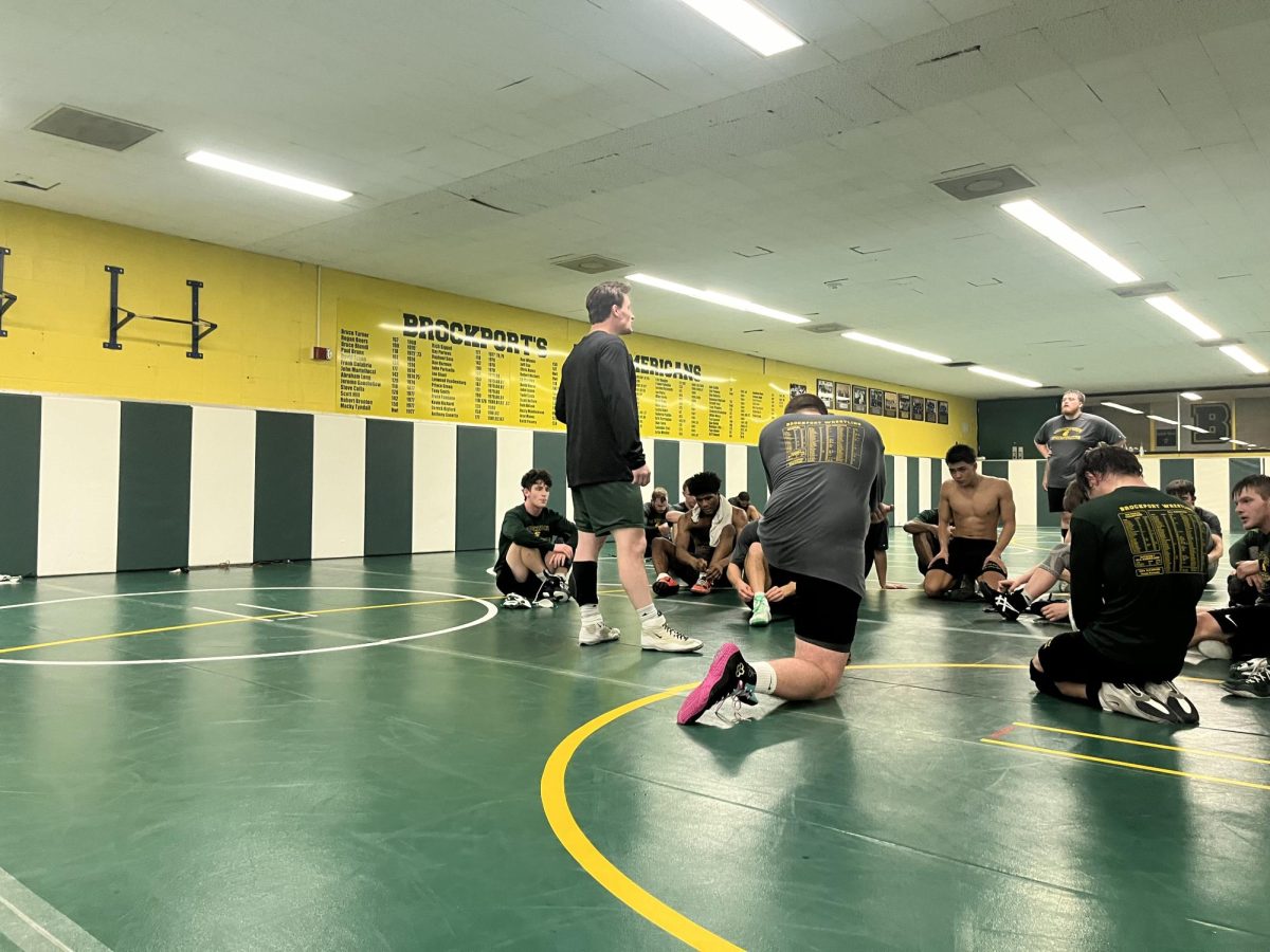 Former wrestler turned coach "takes down" new opportunity